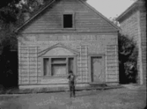 Charlie Chaplin Gif of the house falling around him.