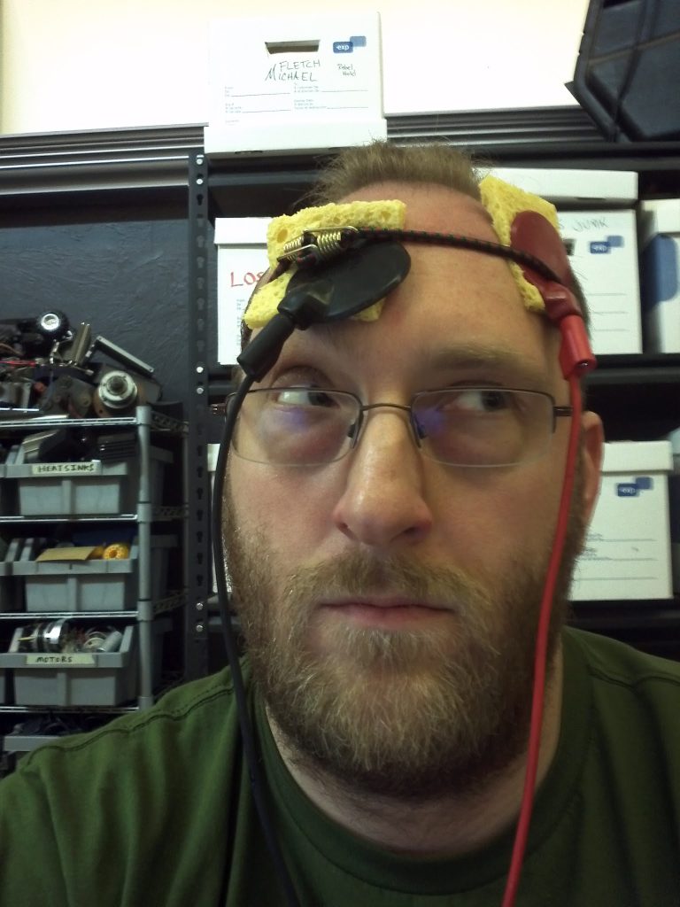 Me doing stupid things to myself like strapping a homemade trans cranial DC Stim device to my head.