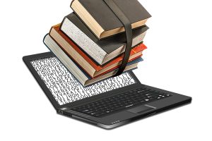 Books over a laptop